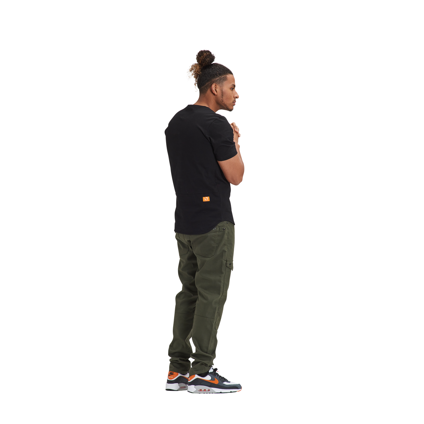 A man wearing a Kulture MIA Drop Cut Tee (3) PK Black / Charcoal / Heather and cargo pants.