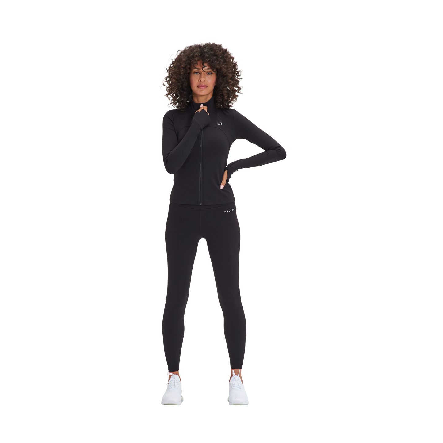 A woman in a Kulture black wetsuit posing for a picture.