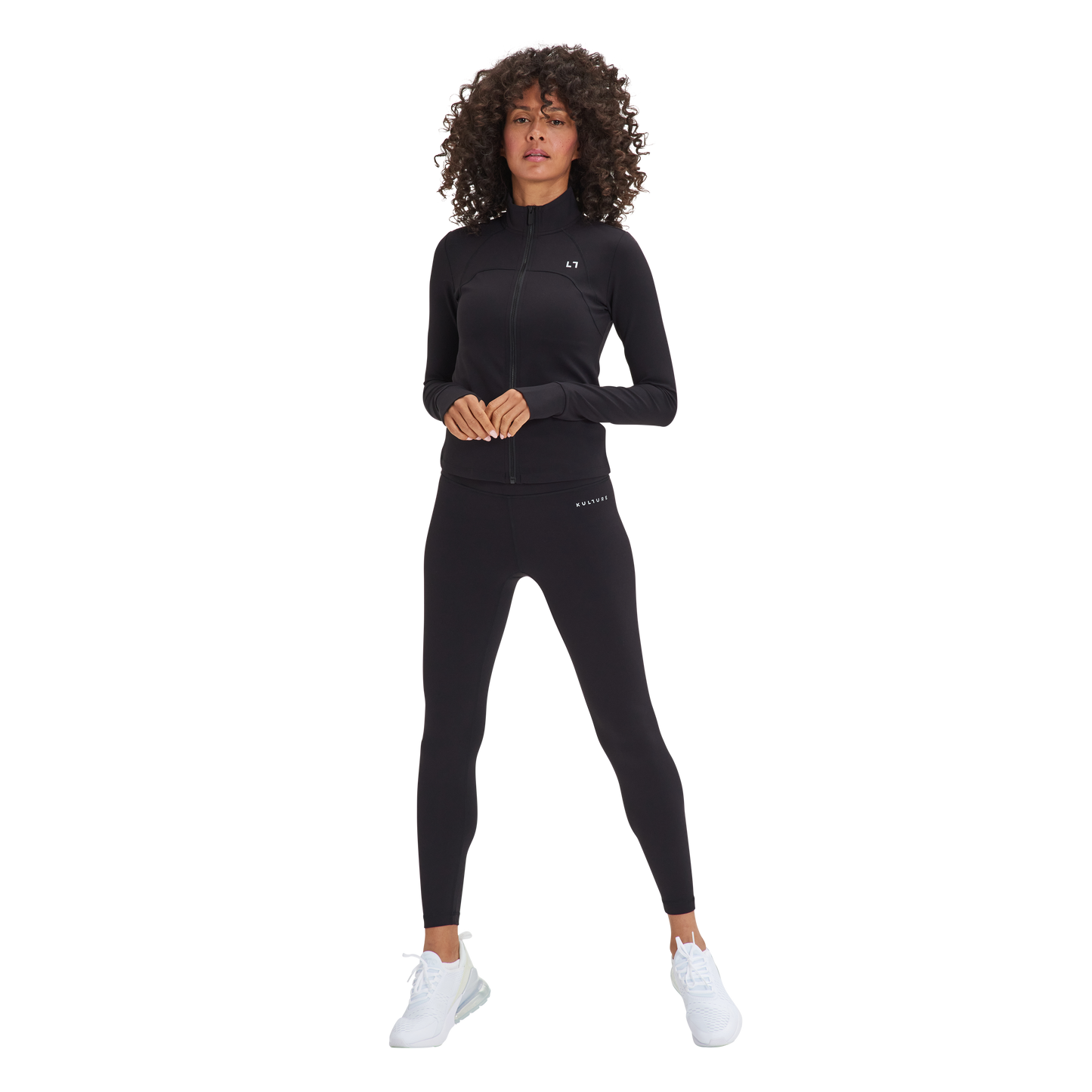 A woman in a black top and Kulture's Soho Sculpt Leggings.