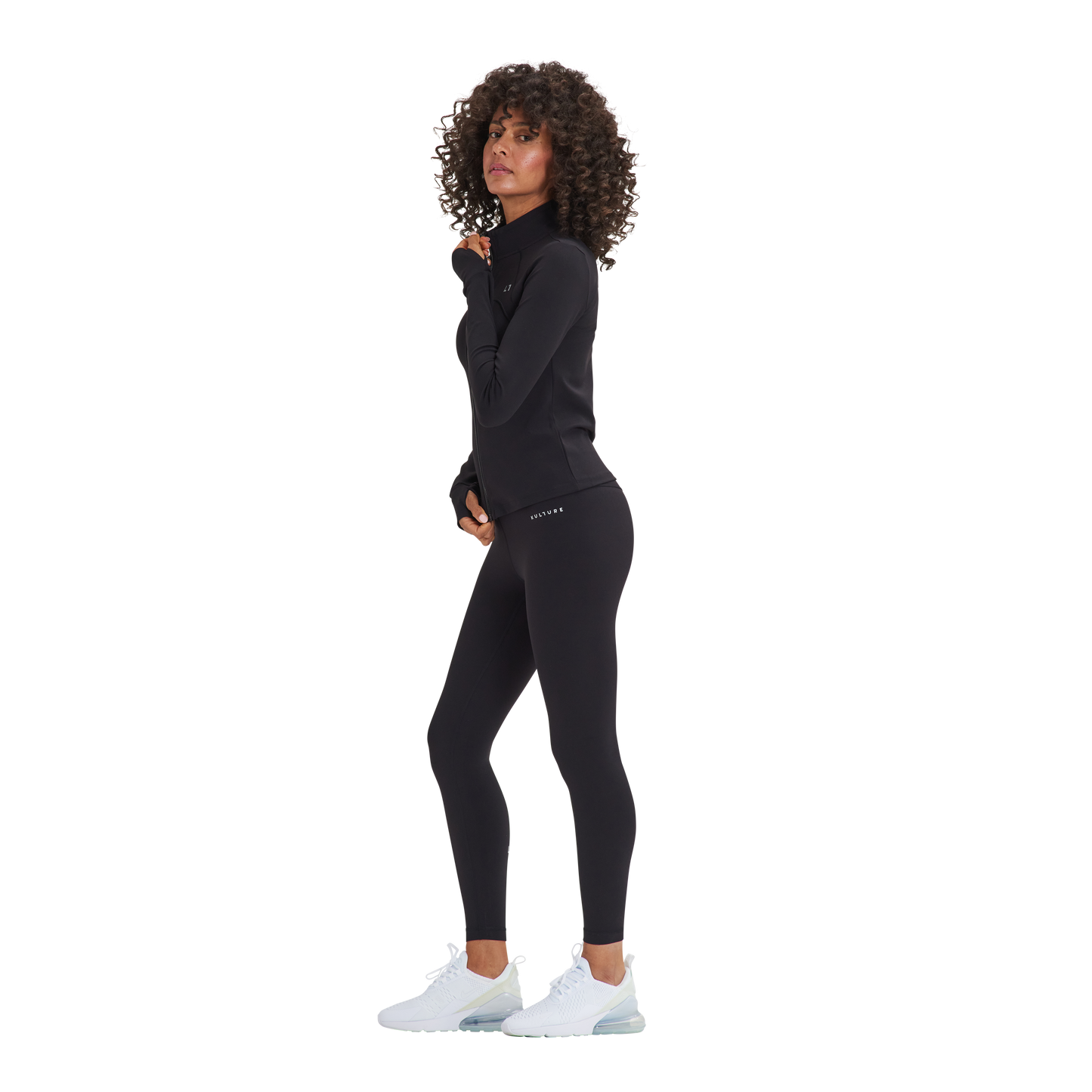A woman in a black top and Kulture's Soho Sculpt Leggings.
