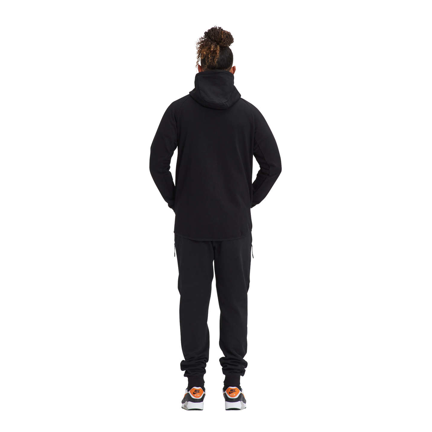 A man wearing a Kulture ATL Black Full-Zip Hoodie & Joggers.