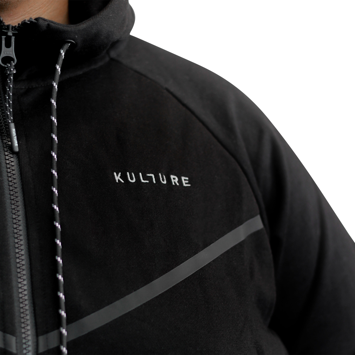 A close up of a person wearing a Kulture ATL Black Full-Zip Hoodie & Joggers.