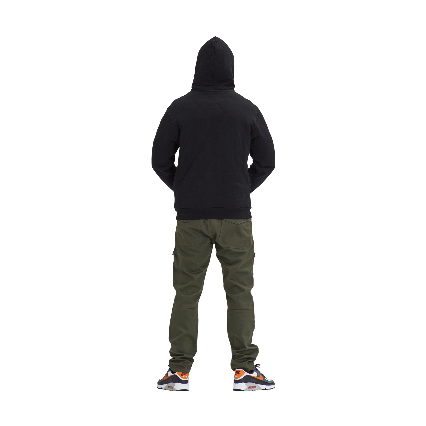 A man in a Kulture JFK V1 Quilted Hoodie and khaki pants.