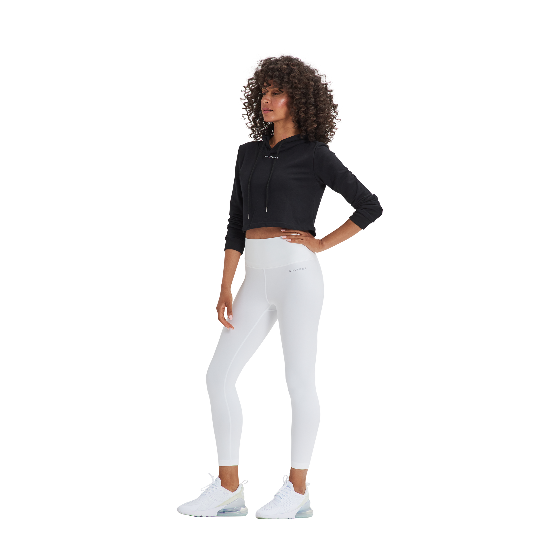 a woman in white pants and a black shirt. -> a woman wearing Kulture's Napa Crop Hoodie.