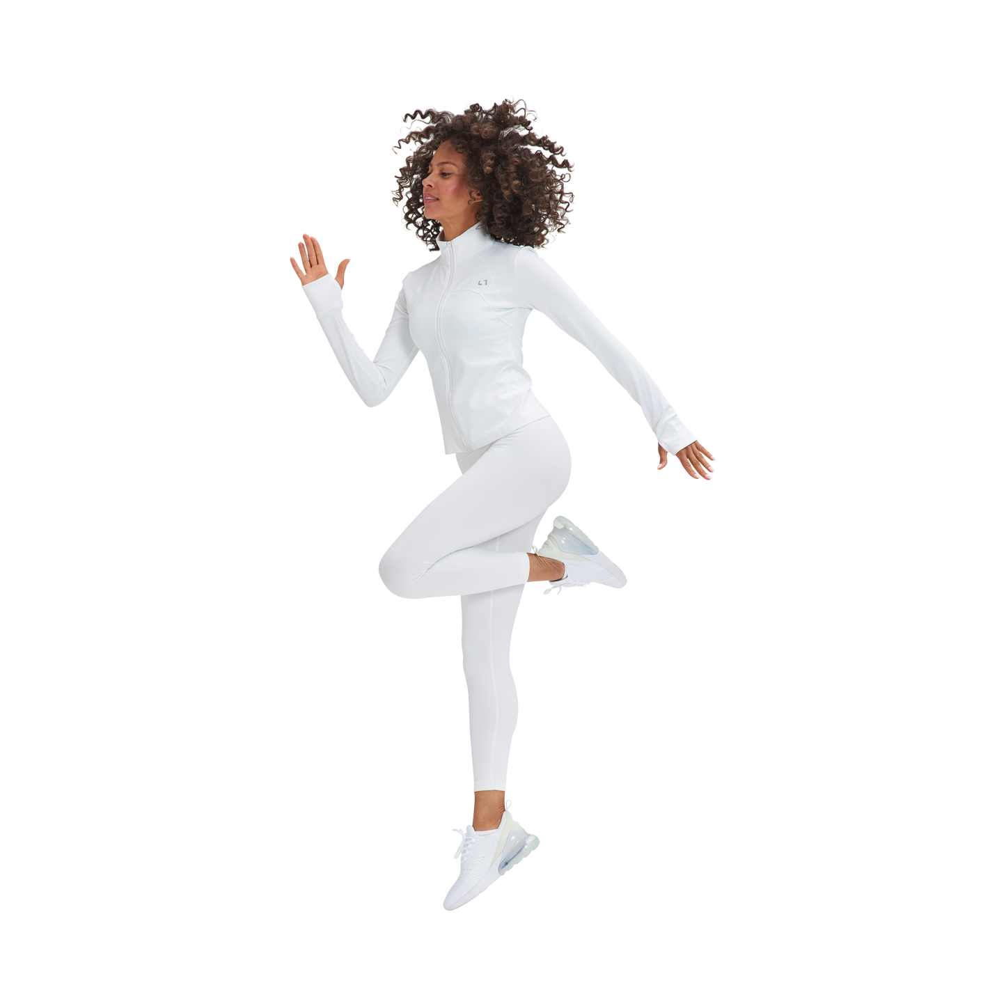 A woman in a white suit is jumping in the air wearing the Marina Sculpt Yoga Jacket by Kulture.