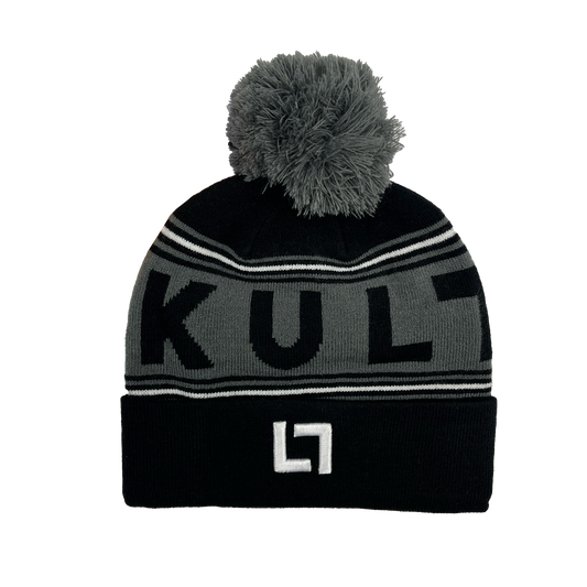 A Knit Pom Beanie with the word Kulture on it.